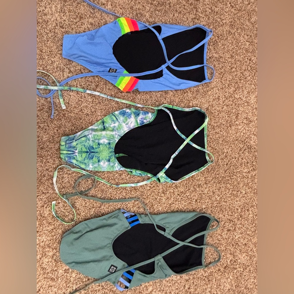 LOT OF JOLYN ONE PIECE SUITS. 3 tie back swim suits